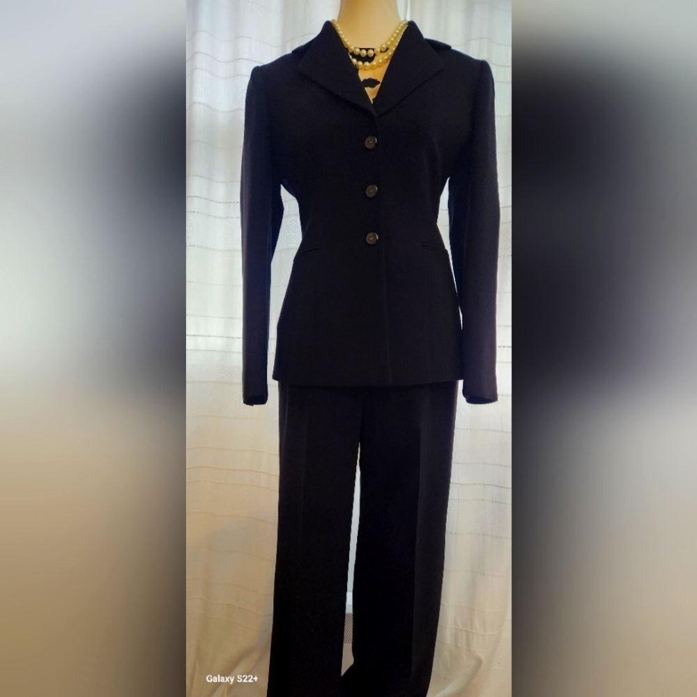 Business suit, black v-neck jacket, beltless slacks